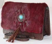 /album/fotogaleria-bandolera-pawnees-burdeos/bandolera-conejo-burdeos-y-marron-frontal-lateral-jpg/